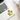 three bright yellow and orange sunflowers with inked accents sticker  on laptop as sample 